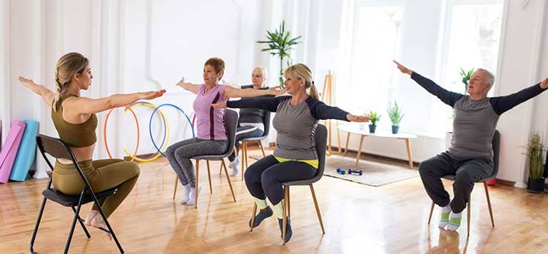The Benefits of Chair Yoga for Seniors  Encore at Avalon Park : Encore at  Avalon Park