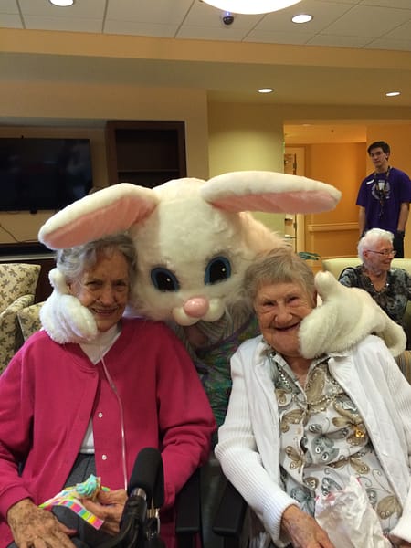 Residents posing with the Easter bunny